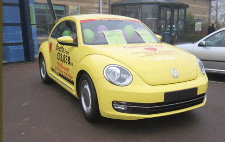 A local car company donated a VW vehicle for a 'Guess how many baloons in a car' competition during a whole weekend of Garden Re-Leaf activites at Huntingdon Garden & Leisure.